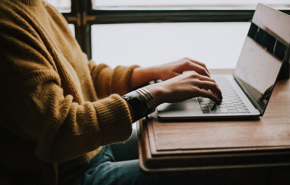 Student studying on a laptop